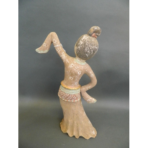 275 - A Chinese Tang style painted terracotta and gilt figure of a dancing geisha, 18½