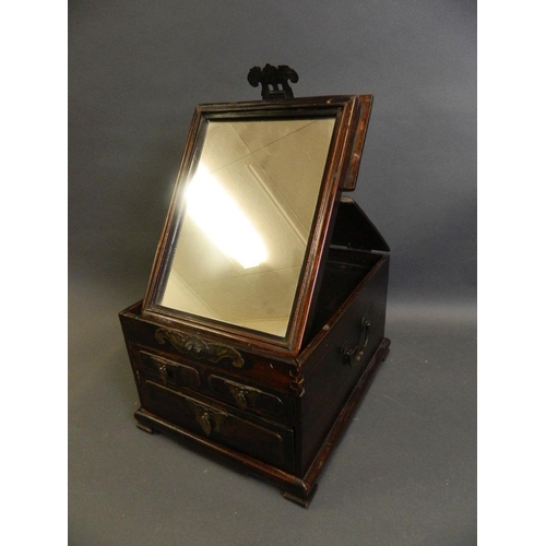 281 - A Chinese hardwood vanity box with three drawers and folding mirror