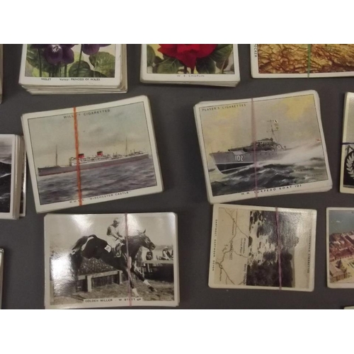 284 - A quantity of cigarette cards including Players 'Cats', 'Old Naval Prints', Wills 'Famous British Li... 