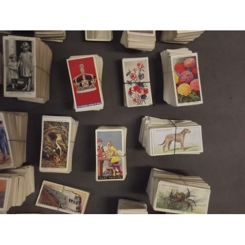 285 - A large quantity of cigarette cards including Wills, Players, Carrera etc, various subjects, part se... 