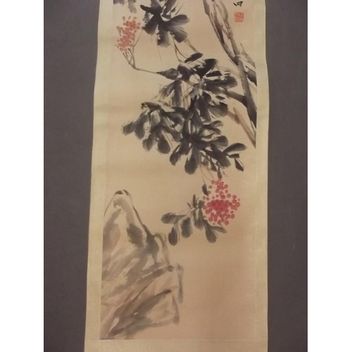 287 - A Chinese watercolour scroll depicting a bush bearing berries, 13½