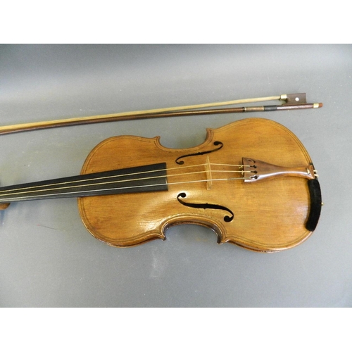 288 - A violin with two piece back, together with a bow and case, labelled, 24