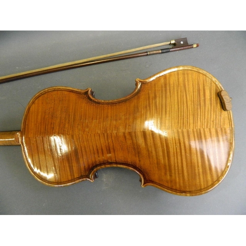 288 - A violin with two piece back, together with a bow and case, labelled, 24