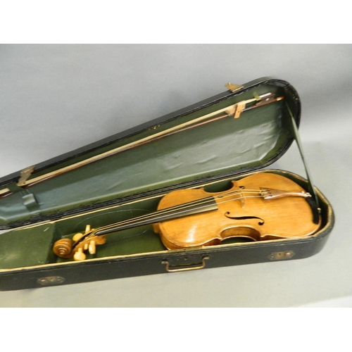 288 - A violin with two piece back, together with a bow and case, labelled, 24