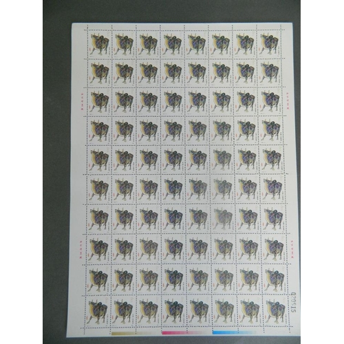 304 - Four sheets of facsimile Chinese stamps depicting zodiac animals, 9½