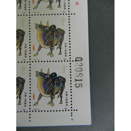 304 - Four sheets of facsimile Chinese stamps depicting zodiac animals, 9½