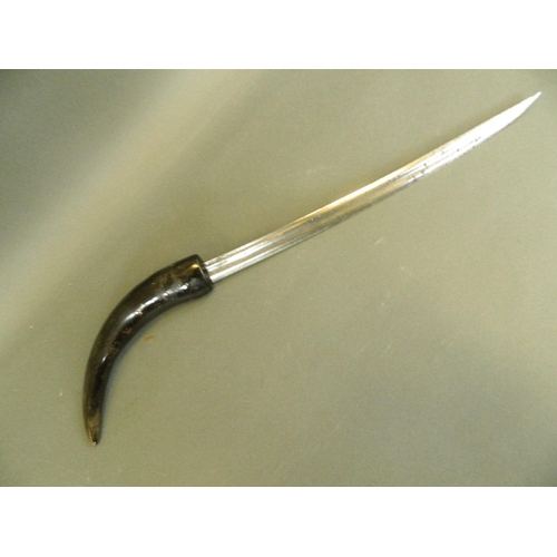 329 - An Eastern horn handled dagger with a curved blade, 19