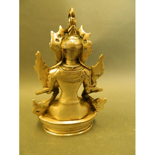 349 - A Chinese metal figure of Buddha seated in meditation, 5½