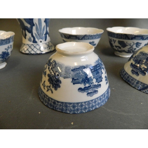 350C - A pair of English blue and white porcelain jars decorated with Asiatic pheasants, together with six ... 