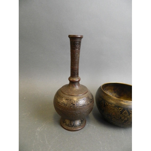 350K - A pair of Indian coppered metal vases with slender necks and chased and enamelled foliate decoration... 