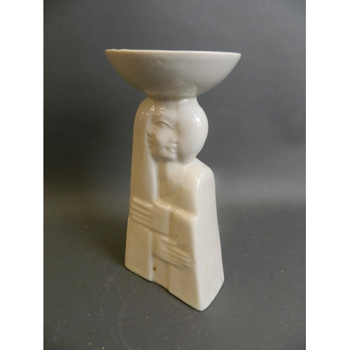 350S - A cream glazed porcelain lamp/candlestick in the form of embracing figures, signature verso, 11