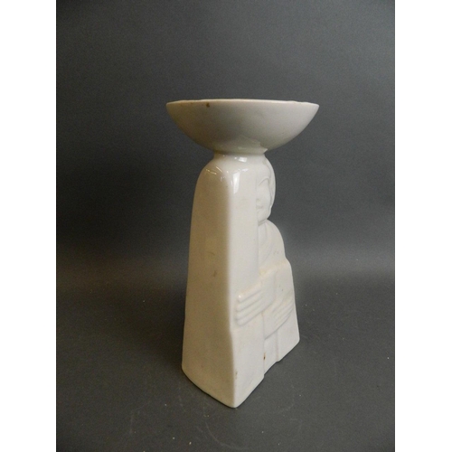 350S - A cream glazed porcelain lamp/candlestick in the form of embracing figures, signature verso, 11