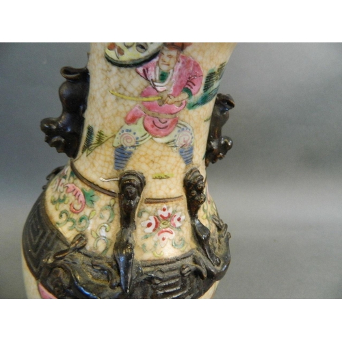 364 - A C19th Japanese Satsuma stoneware vase decorated with dignitaries and warriors in bright enamels, w... 