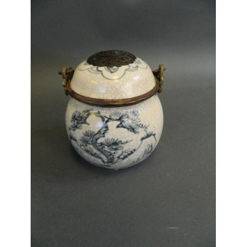 369 - A Japanese blue and white porcelain lamp in the form of a ginger jar with metal mounts decorated wit... 