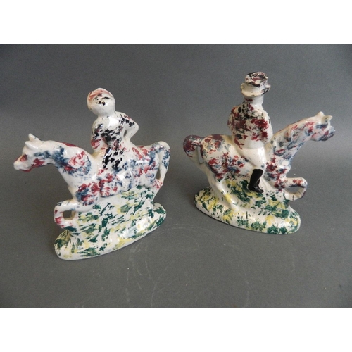 375T - A pair of C19th Portobello figures of riders on horseback decorated in bright enamels, 6½