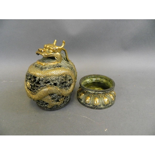 389 - A Chinese polished bronze incense burner with pierced lid in the form of a coiled dragon, 6 characte... 