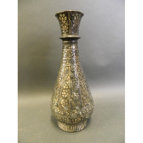 4 - A Bidri style bronze vase with white metal inlaid decoration, 10