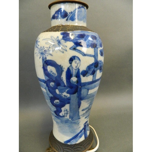 401 - A Chinese blue and white porcelain baluster vase decorated with figures in a garden, and an ironston... 