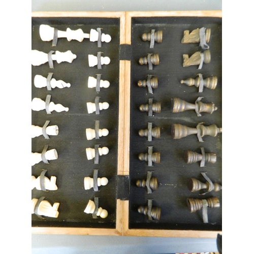 421 - A complete chess set in a fitted box, and another smaller set, king 3