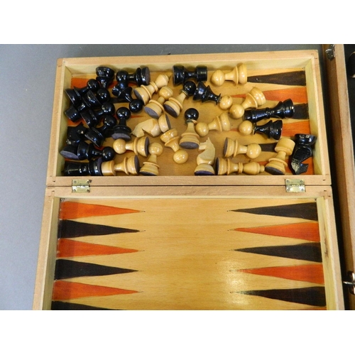 421 - A complete chess set in a fitted box, and another smaller set, king 3