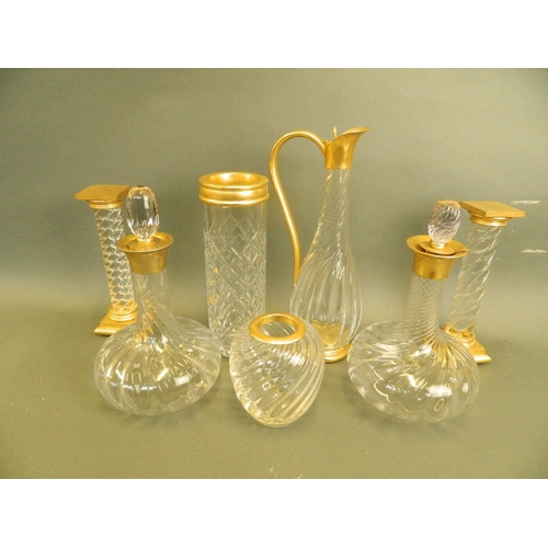 425H - A collection of seven pieces of Continental glass items with gilt collars and fittings, comprising c... 