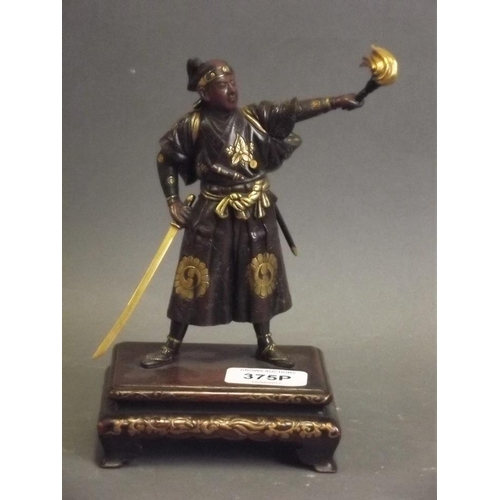 43 - A fine Japanese Meiji period Miyao bronze figure of a samurai bearing a flaming torch, with gilt was... 