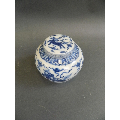 443 - A Chinese blue and white porcelain ginger jar and cover with kylin decoration, seal mark to base, 3½... 