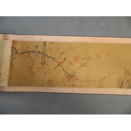 455 - A Chinese watercolour scroll depicting birds and calligraphy, 11