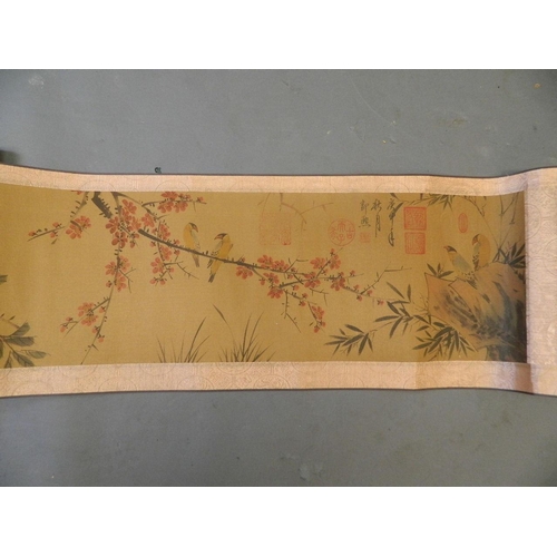 455 - A Chinese watercolour scroll depicting birds and calligraphy, 11