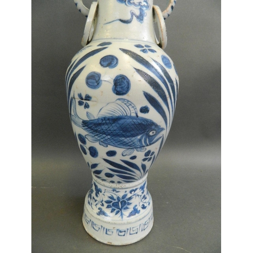 456 - A large Chinese Ming style blue and white porcelain vase with twin elephant mask handles and painted... 