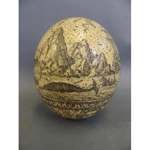 466 - A large Scrimshaw carved egg depicting whaling scenes, 5½