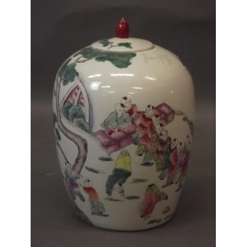 471 - An early C20th Chinese famille verte jar and cover with enamel decoration of boys dancing in process... 