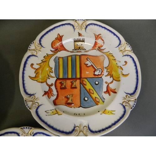 478 - Three C19th porcelain plates with later painted coat of arms decoration, impressed Lozenge marks, 10... 