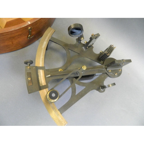 48 - A vintage marine sextant by 'Keohan, London', in a fitted mahogany box, 9½