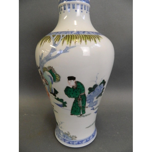 480 - A Chinese famille verte porcelain vase with enamelled decoration of a fisherman and three travellers... 