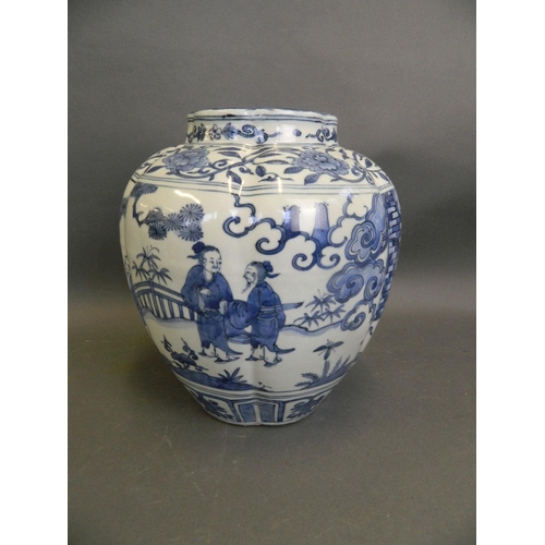 489 - A Chinese blue and white porcelain ribbed vase with painted decoration of figures relaxing in a gard... 