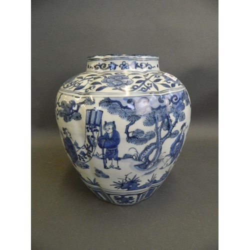 489 - A Chinese blue and white porcelain ribbed vase with painted decoration of figures relaxing in a gard... 