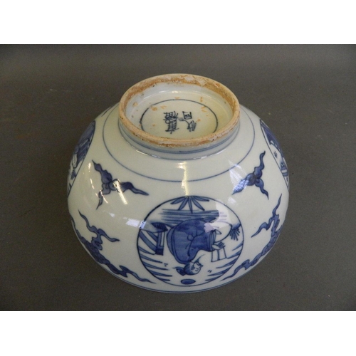 496 - A Chinese blue and white porcelain bowl with decorative panels depicting scholars, 4 character mark ... 