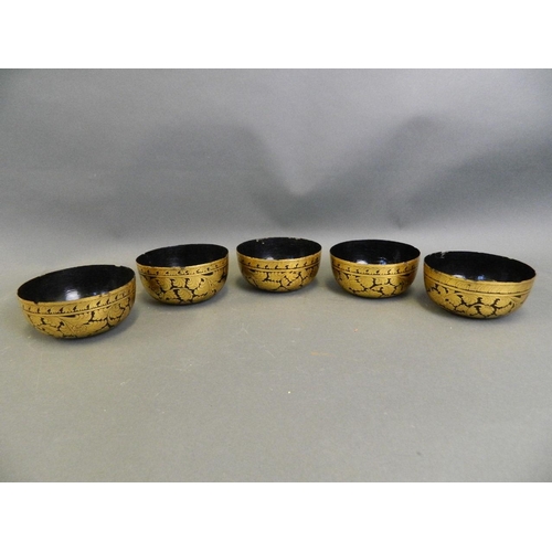 50B - A set of five Thai black lacquer potpourri  bowls with gilt scrolling foliate decoration, 5