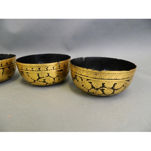 50B - A set of five Thai black lacquer potpourri  bowls with gilt scrolling foliate decoration, 5