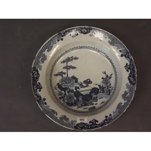 50C - A C19th Delft blue and white bowl with Oriental inspired decoration, 15½