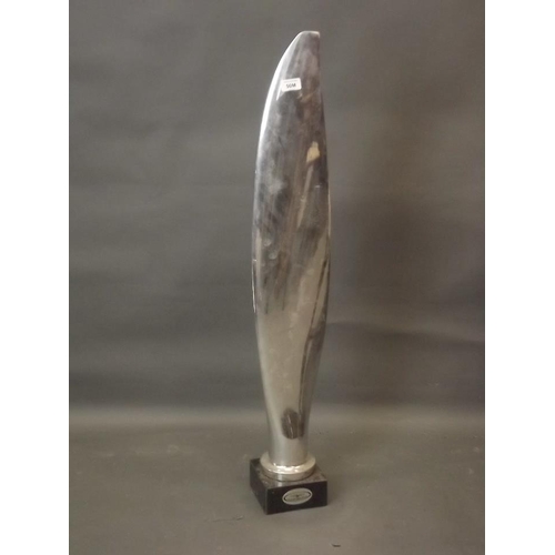 50M - A chromed model of a propeller blade, mounted on a marble base, 38