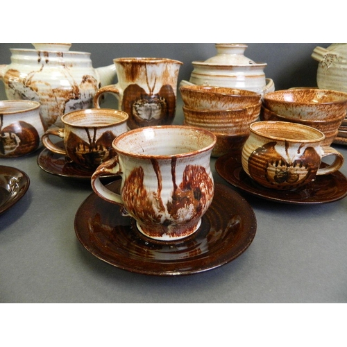 50X - A collection of 1950s studio pottery by Eileen Stevens comprising six place tea set with butterfly d... 