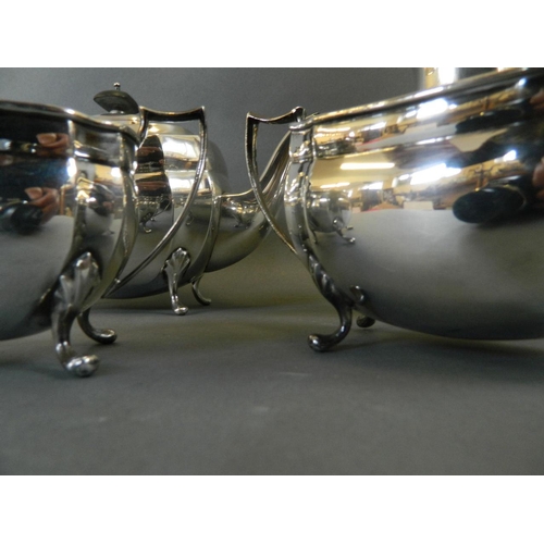 520 - A four piece silver plated tea service of classical form with ebony handles, by Wheeldon Bros., hot ... 