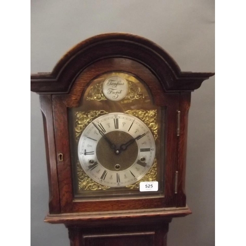 525 - A 1930s oak long case clock with spring driven movement and Westminster chimes, marked 'Clarion Cloc... 