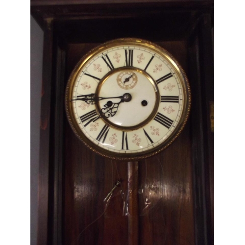 541 - A mahogany Vienna wall clock with enamelled dial, 13