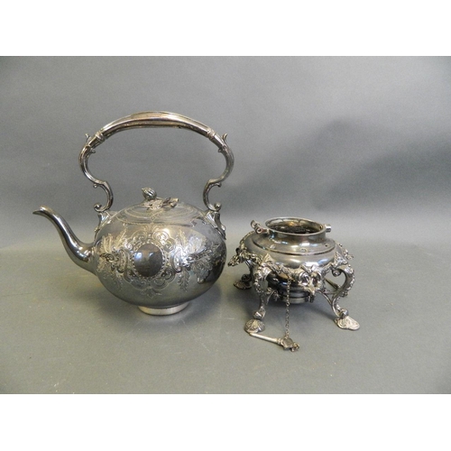 557 - A Sheffield silver plated spirit kettle with chased and engraved vine and swag decoration, complete ... 