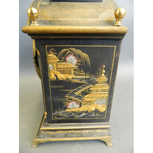 560 - A 1920s black lacquered wood mantle clock with chinoiserie decoration, 7½