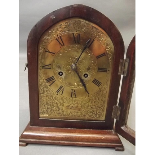 597 - A C19th French mahogany cased mantle clock, the dial with chased and engraved floral scroll decorati... 