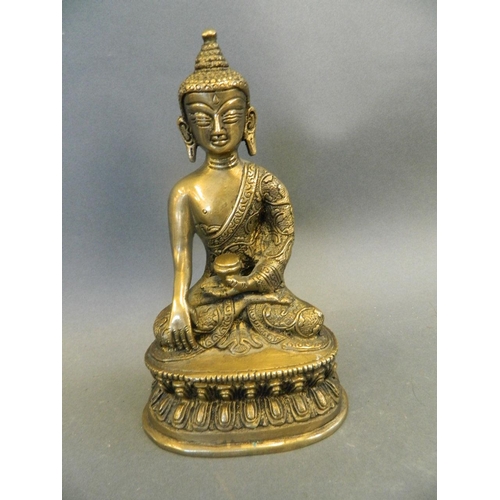 6 - A Chinese bronze figure of Buddha seated in meditation, 7